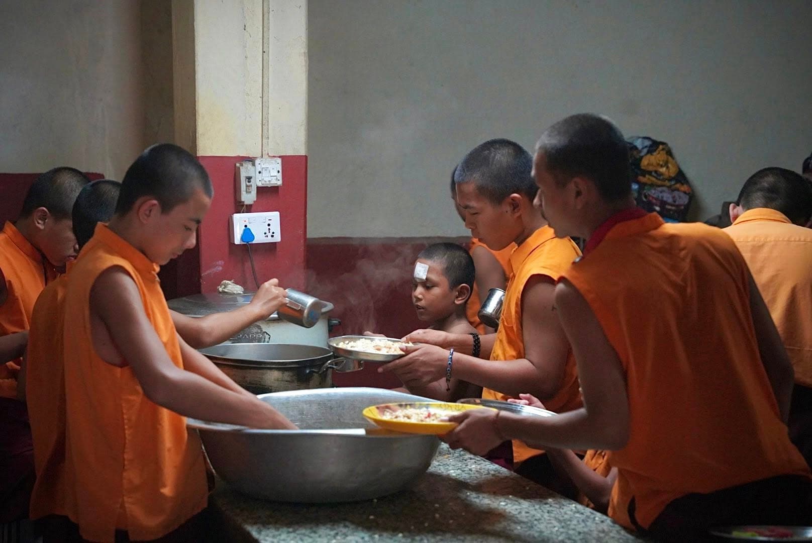 Monks serving food